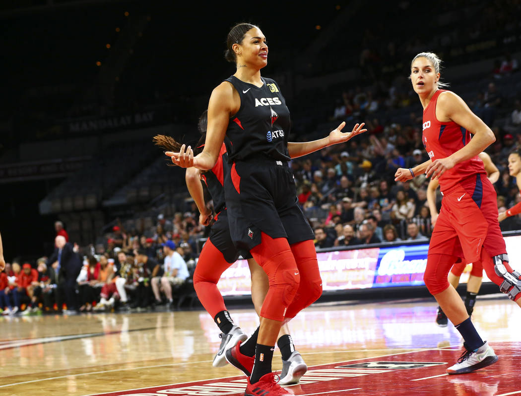 Las Vegas Aces center Liz Cambage (8) reacts after scoring against the Washington Mystics durin ...