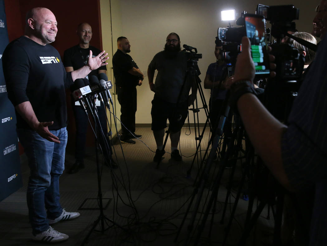 Ultimate Fighting Championship president Dana White talks to the news media about the opening w ...