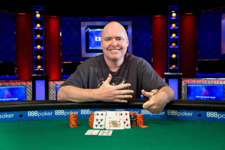 John Hennigan celebrates after winning the $10,000 buy-in Seven Card Stud event Wednesday, June ...