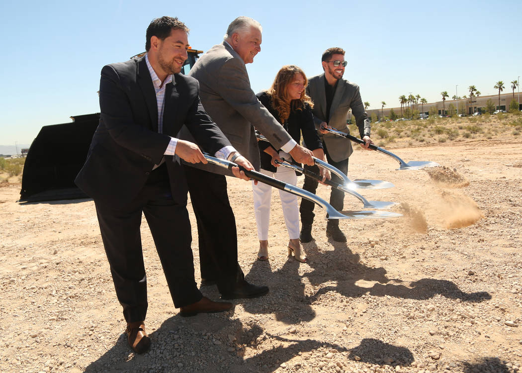 (From right to left) Rob Roy, CEO of Switch, City Commissioner Marilyn Kirkpatrick, Nevada Gove ...