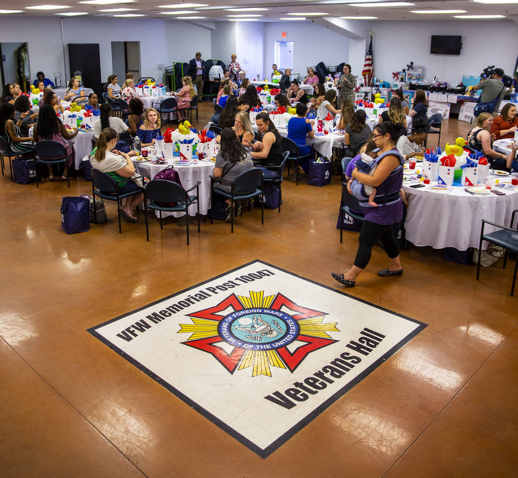 Invited guests enjoy lunch and a few speakers during the Operation Homefront sponsored Star-Spa ...