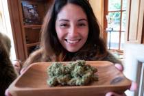 Christy Banda, a representative for the Jack Herer cannabis company, displays their latest mari ...