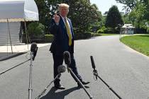 President Donald Trump speaks to reporters on the South Lawn of the White House in Washington, ...