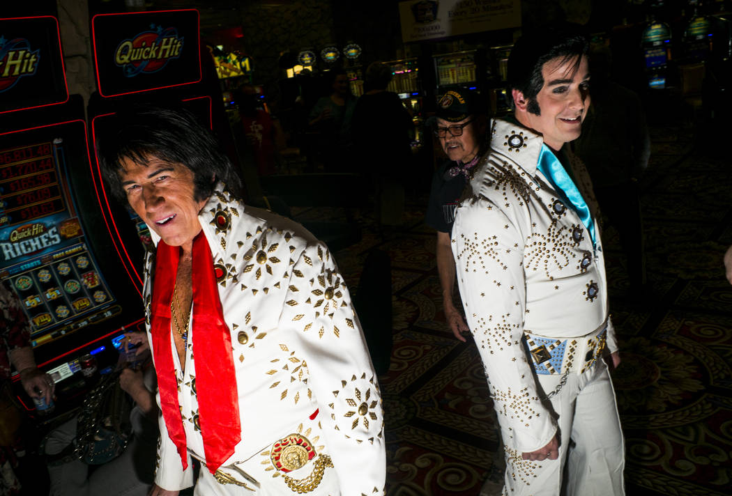 Elvis tribute artist John Gilpin, of Lakewood, Calif., left, and Rob Ely, of Oakdale, Calif., m ...