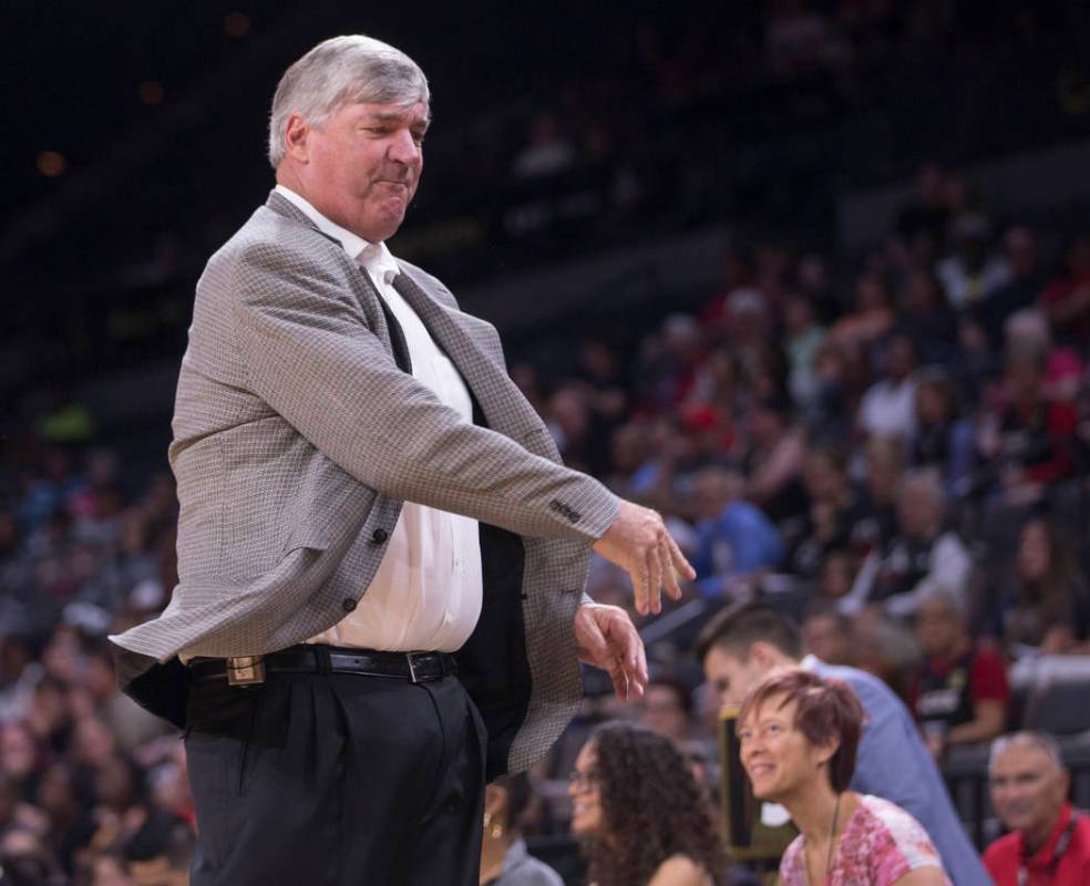 Las Vegas Aces head coach Bill Laimbeer throws a cup after getting a technical foul in the four ...