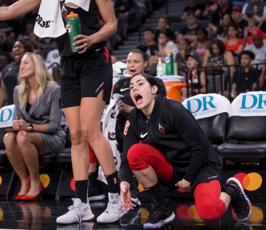 Las Vegas Aces guard Kelsey Plum (10) cheers for her teammates in the fourth quarter during the ...