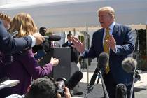 President Donald Trump speaks to reporters on the South Lawn of the White House in Washington, ...