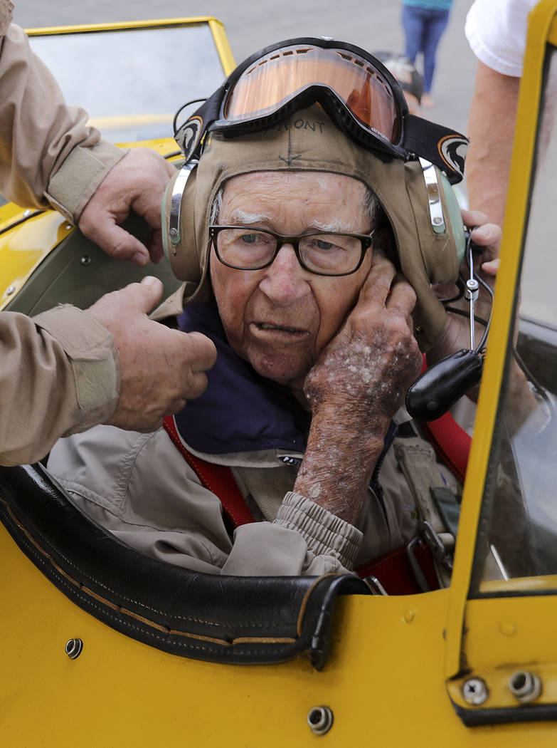 In this June 14, 2019, photo retired Air Force Lt. Col. Bill Willis, 97, gets ready for a fligh ...
