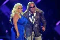 Duane "Dog" Chapman, right, and Beth Chapman present the award for CMT performance of the year ...