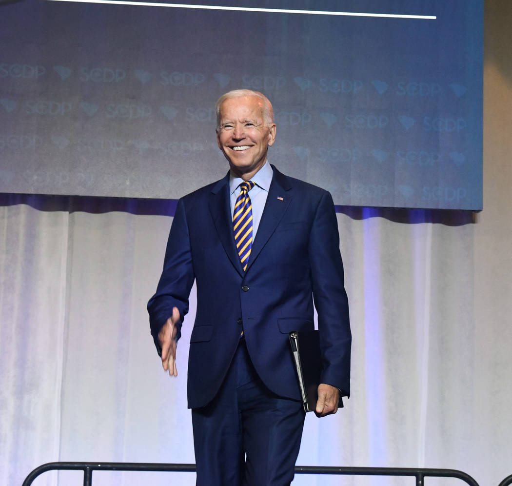 Former Vice President Joe Biden arrives on stage at the South Carolina Democratic Party convent ...