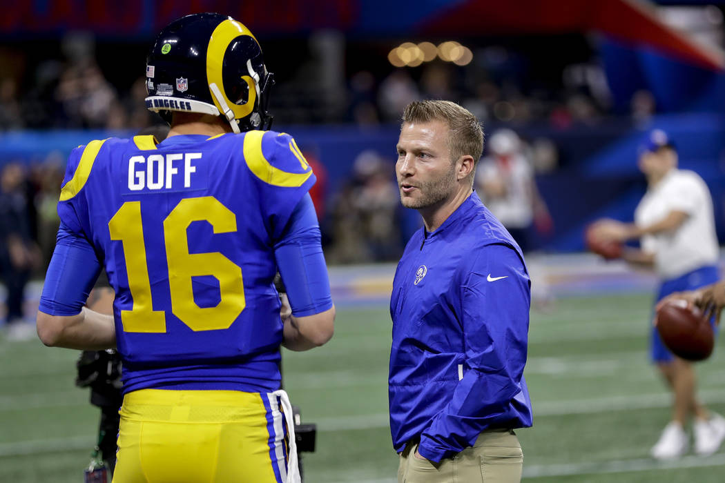 Los Angeles Rams head coach Sean McVay, right, talks with Jared Goff before the NFL Super Bowl ...
