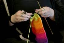 This April 30, 2018 file photo shows a woman knitting in Silverdale Wash. A free, 8-million str ...