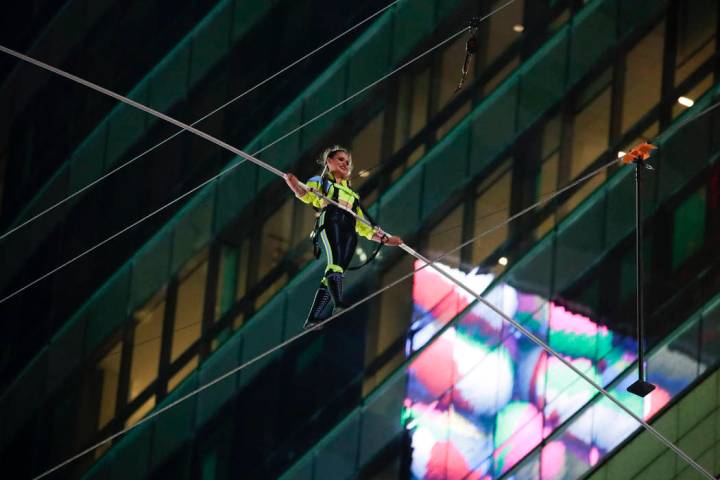 Aerialist Lijana Wallenda walks on a high wire above Times Square, Sunday, June 23, 2019, in Ne ...