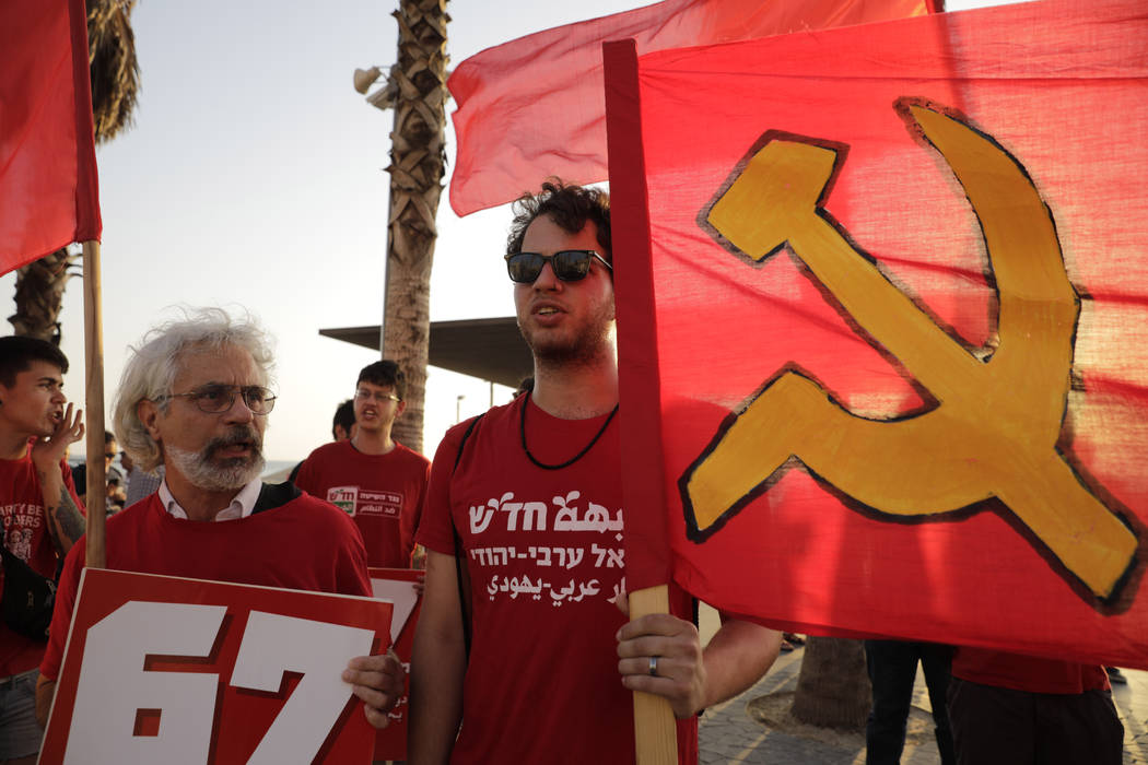 People protest against the conference in Bahrain, which focuses on the economic portion of the ...