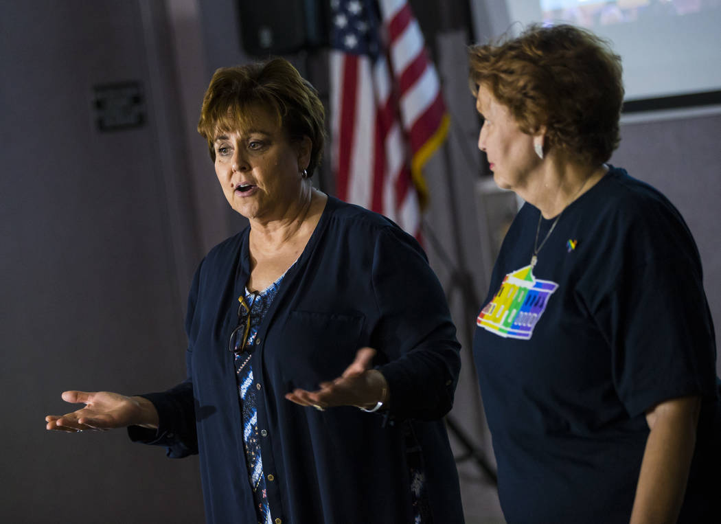 Marla Turner, left, speaks alongside Donna West, chair of the Clark County Democratic Party, be ...