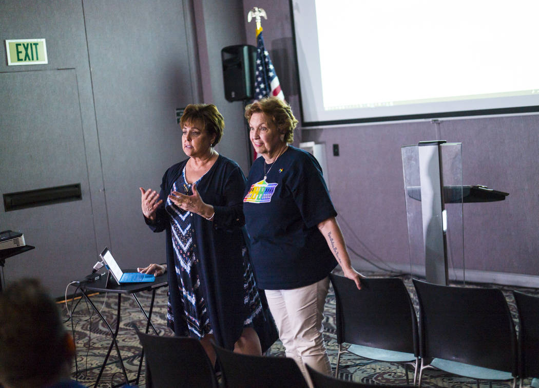 Marla Turner, left, speaks alongside Donna West, chair of the Clark County Democratic Party, be ...