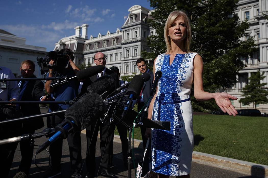 White House counselor Kellyanne Conway talks to reporters outside the White House, Monday, June ...