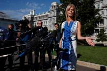 White House counselor Kellyanne Conway talks to reporters outside the White House, Monday, June ...