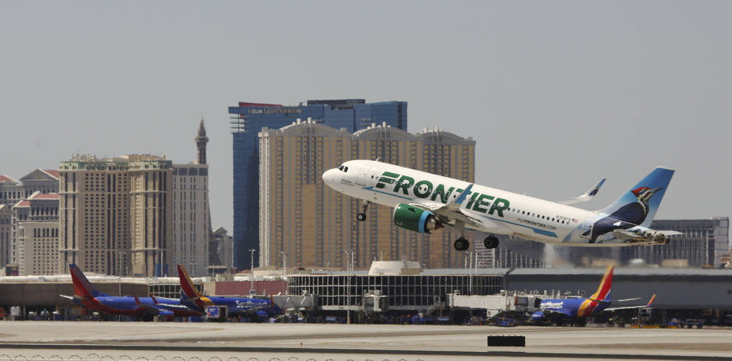 A Frontier airlines flight departs for takeoff at McCarran International Airport on Wednesday, ...