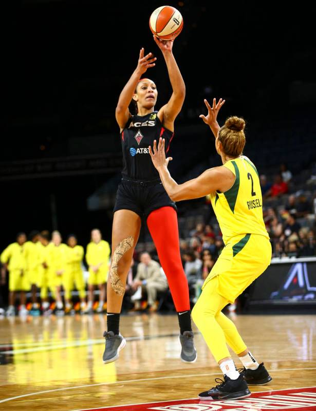 Las Vegas Aces center A'ja Wilson (22) shoots over Seattle Storm center Mercedes Russell (2) du ...