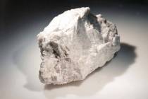 The "Genesis Rock," a 4.4 billion-year-old anorthosite sample approximately 2 inches in length, ...