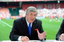 In this June 2, 2013, photo provided by ESPN Images, Bob Ley talks during an international frie ...