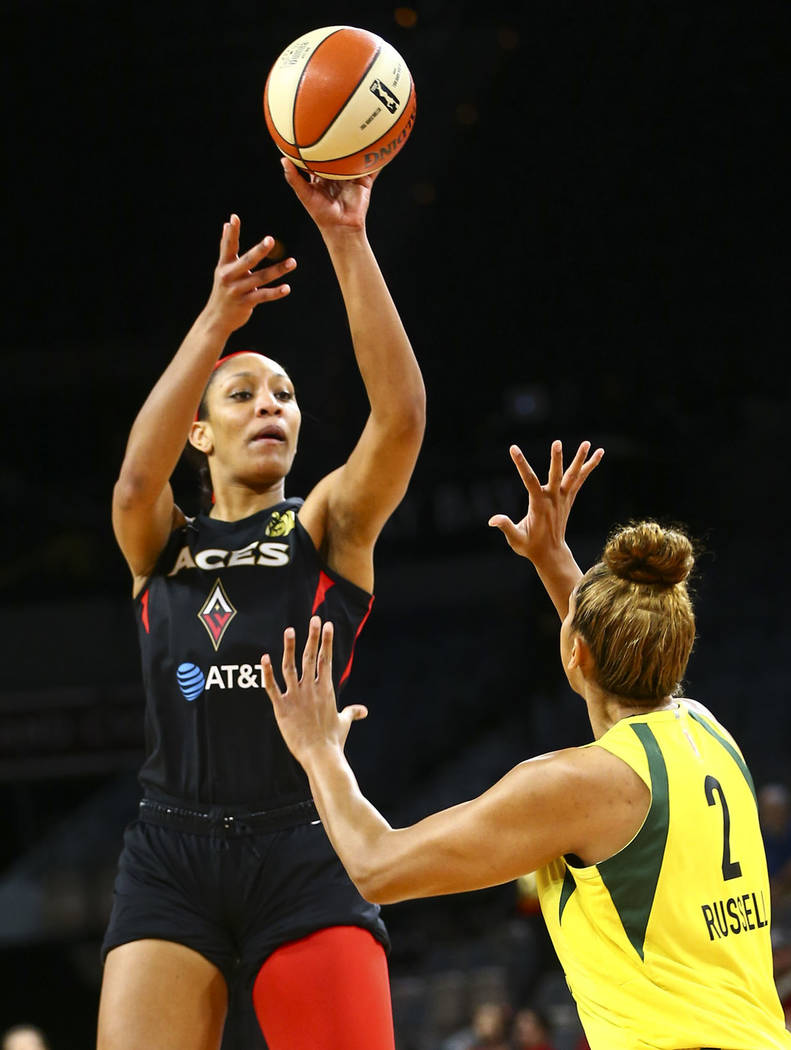 Las Vegas Aces center A'ja Wilson (22) shoots over Seattle Storm center Mercedes Russell (2) du ...