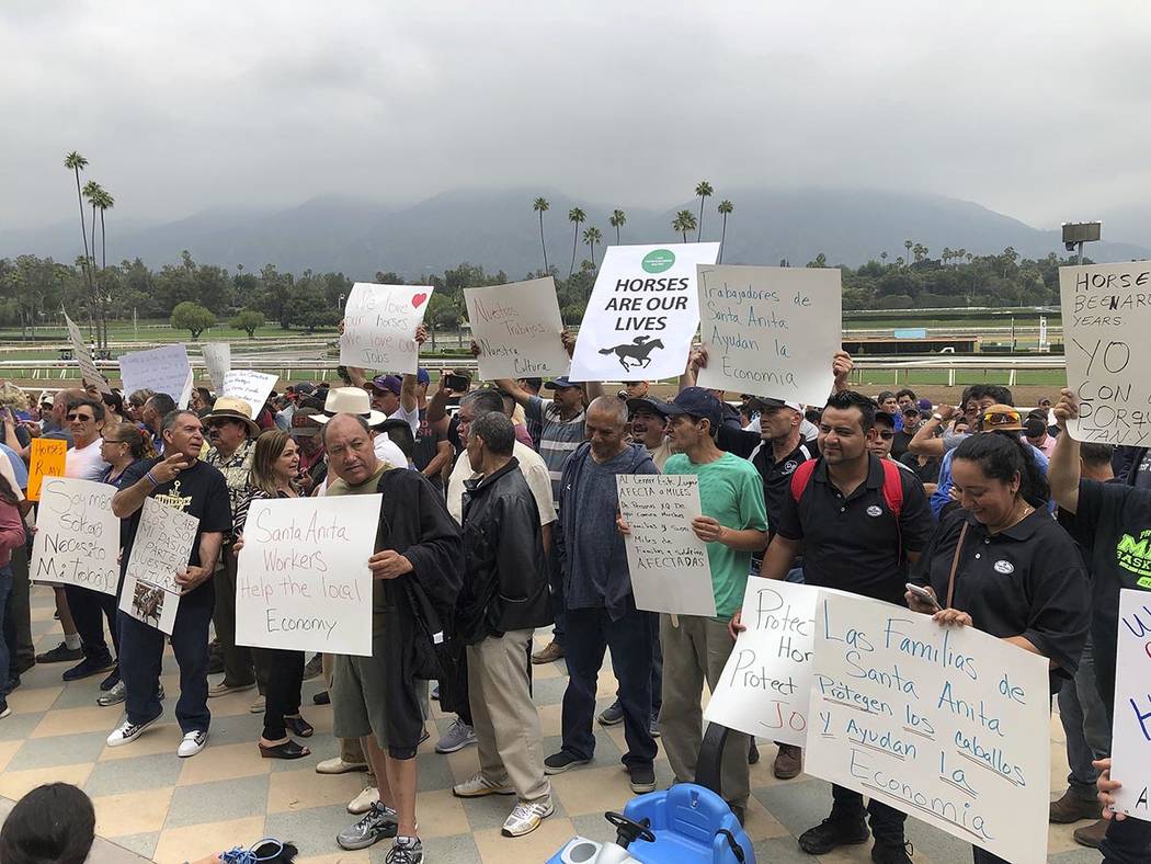 In this June 20, 2019 file photo Santa Anita Park workers hold a rally at the track in Arcadia, ...