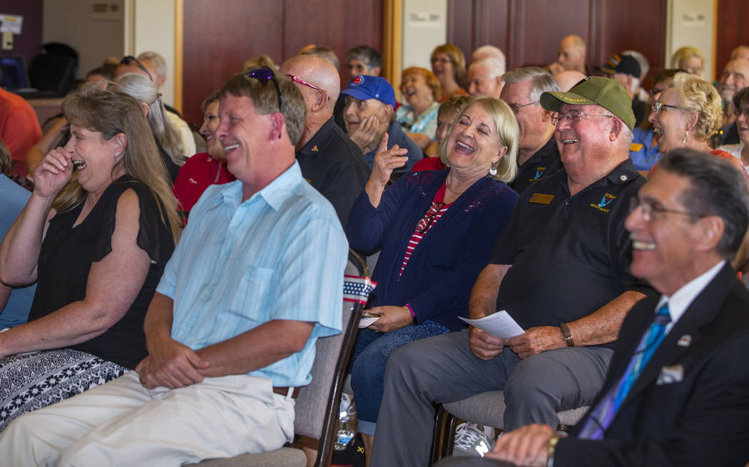 Invited guests enjoy a video as The Veterans Club of Sun City Aliante and the city of North Las ...