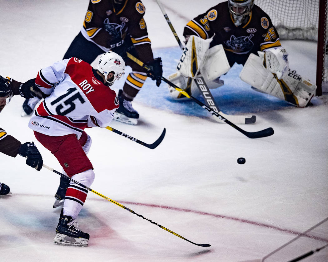 Charlotte Checkers center Nicolas Roy (15) skates against the Chicago Wolves on June 6, 2019, d ...