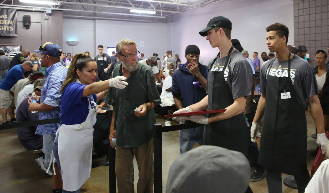 Karla Hernandez, a volunteer, assigns clients to Vegas Golden Knights Development Camp particip ...