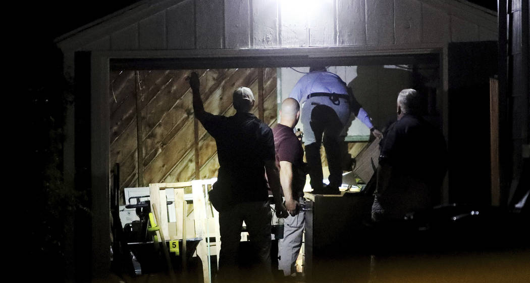 Salt Lake City Police search a home in connection to the disappearance of University of Utah st ...
