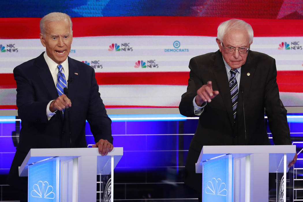 Democratic presidential candidate former vice president Joe Biden, left, and Sen. Bernie Sander ...