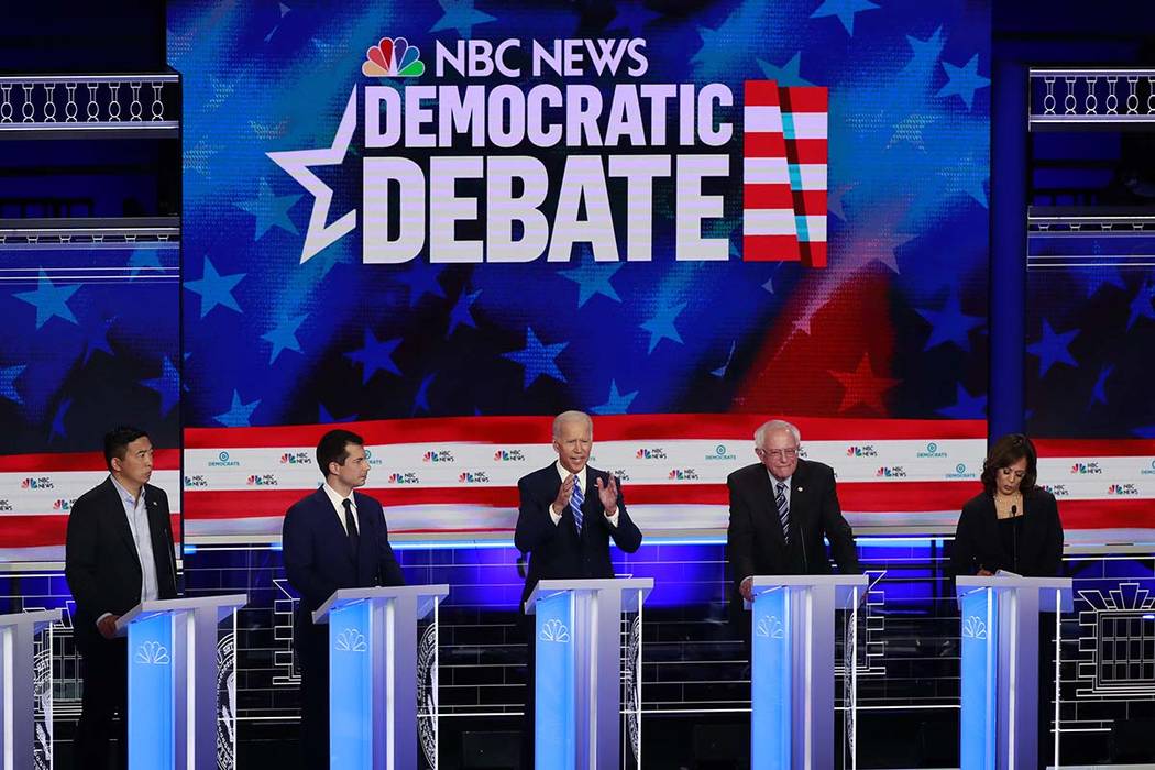 Democratic presidential candidate former Vice President Joe Biden, center, speaks during the De ...