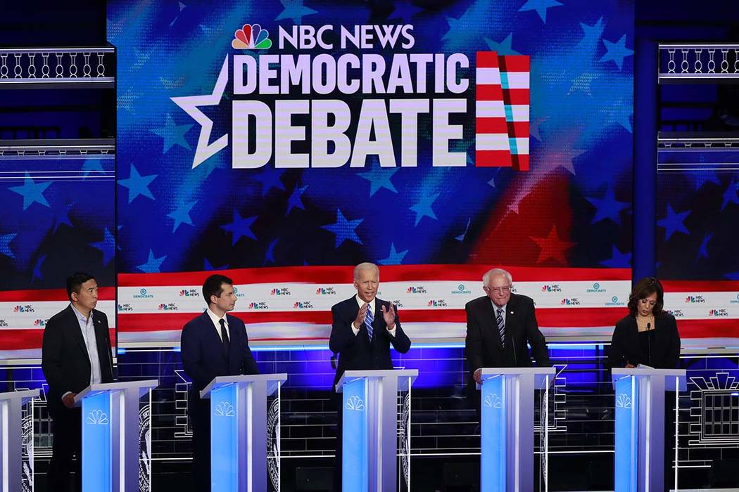 Democratic presidential candidate former Vice President Joe Biden, center, speaks during the De ...