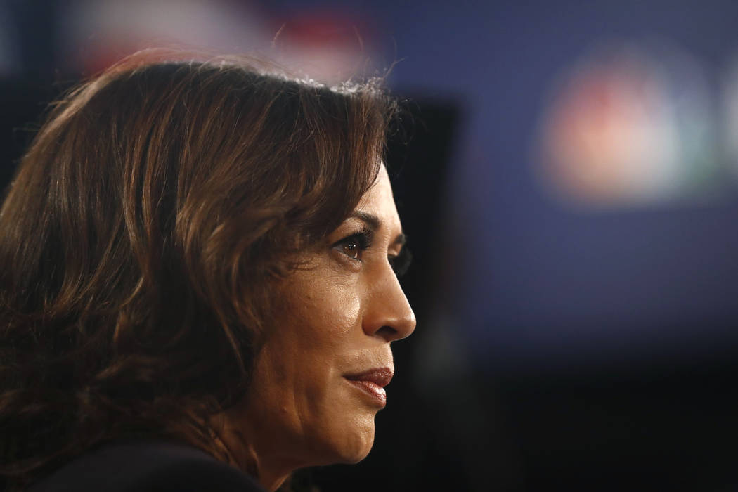 Democratic presidential candidate Sen. Kamala Harris, D-Calif., listens to questions in the spi ...