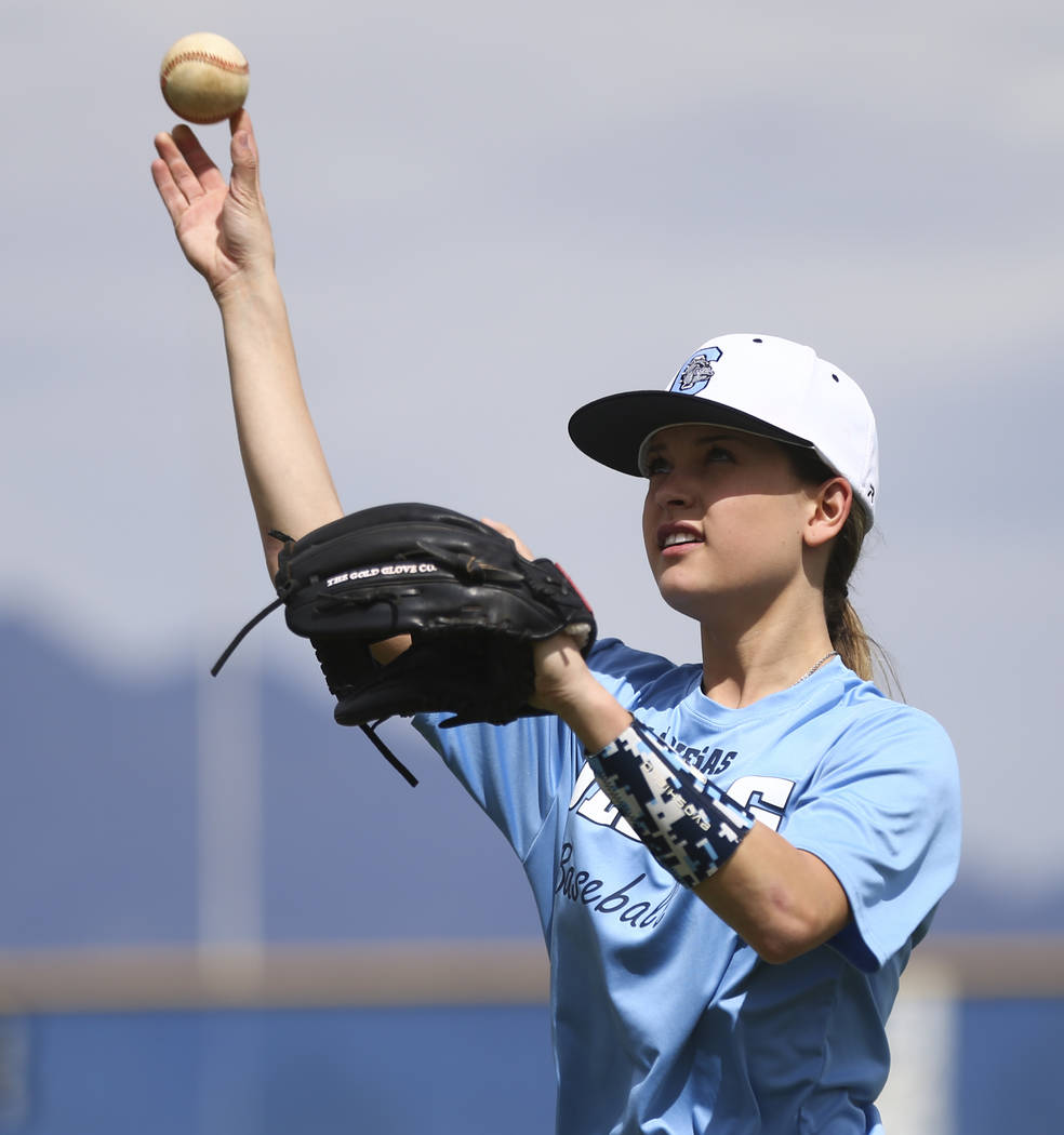 Centennial sophomore Denae Benites practices on the baseball field at Centennial High School in ...