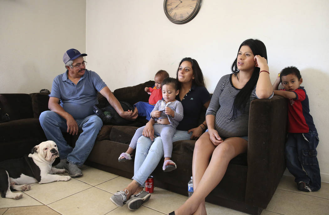 Rogelio Regalado Sr., left, and his daughters Jessica, center, and Carla, right, think back on ...