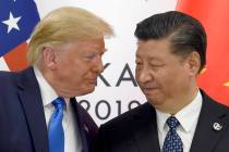 President Donald Trump, left, meets with Chinese President Xi Jinping during a meeting on the s ...
