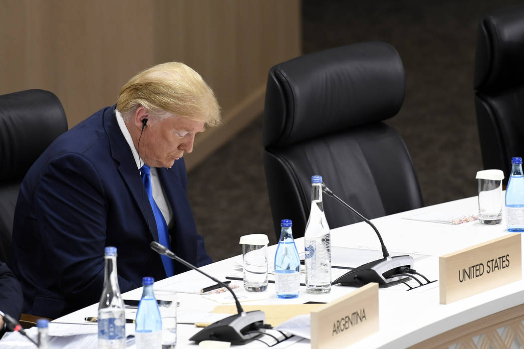 President Donald Trump attends the G-20 summit session on women's workforce participation, futu ...