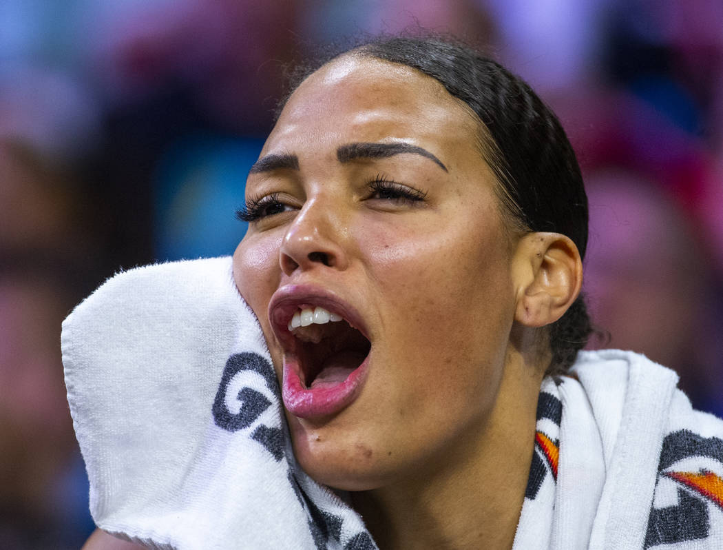 Las Vegas Aces center Liz Cambage yells in support of her teammates from the bench versus the I ...