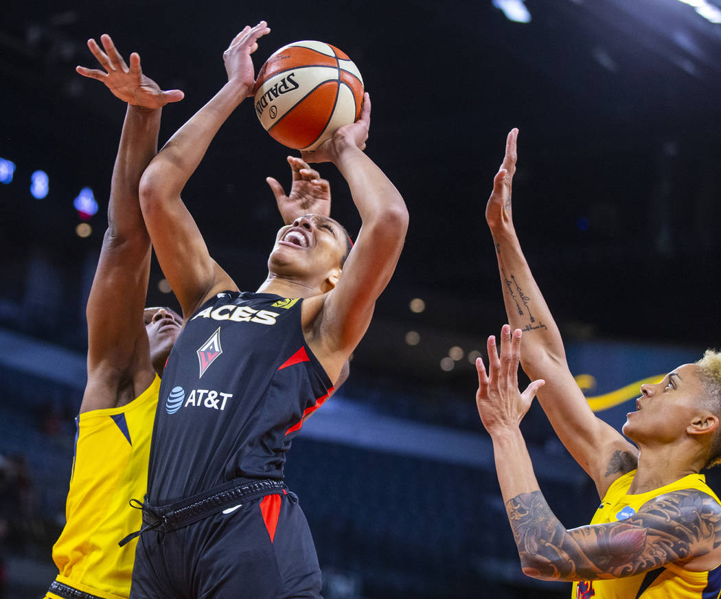 Las Vegas Aces forward A'ja Wilson (22) powers up to the basket inside of Indiana Fever center ...