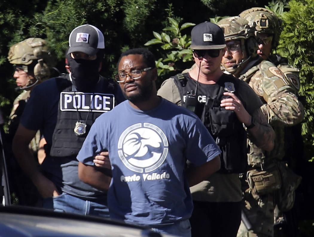 Salt Lake City police take Ayoola A. Ajayi into custody in connection with missing University o ...