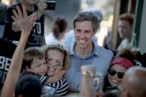 Democratic presidential candidate Beto O'Rourke poses for a photo with supporters following a c ...