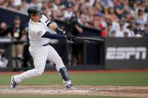 New York Yankees' Gary Sanchez hits a two-RBI single against the Boston Red Sox during the seve ...