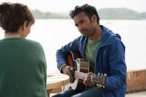 This image released by Universal Pictures shows Lily James, left, and Himesh Patel in a scene f ...