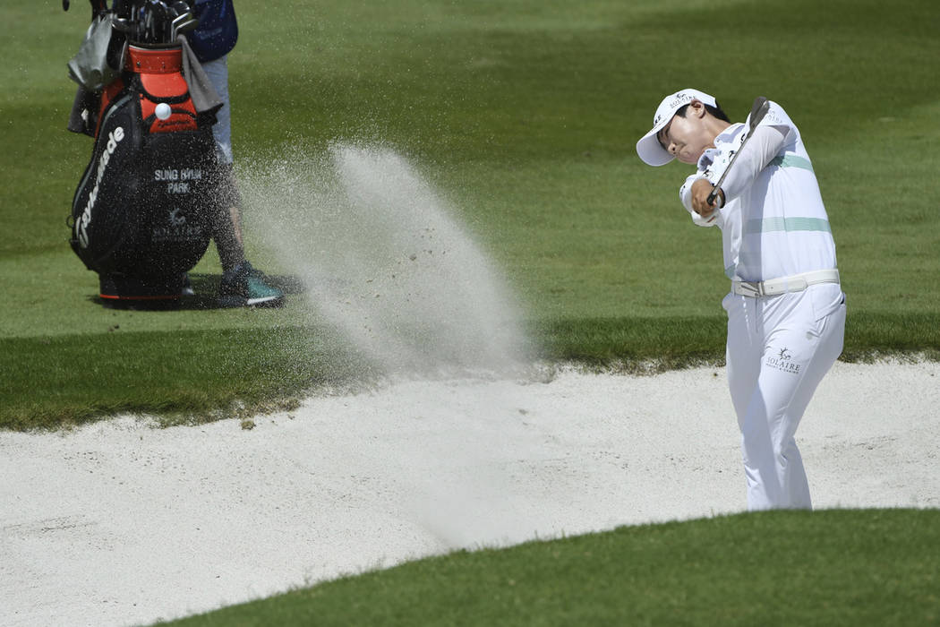 Sung Hyun Park hits out of a bunker on the 9th hole in the LPGA Walmart NW Arkansas Championshi ...