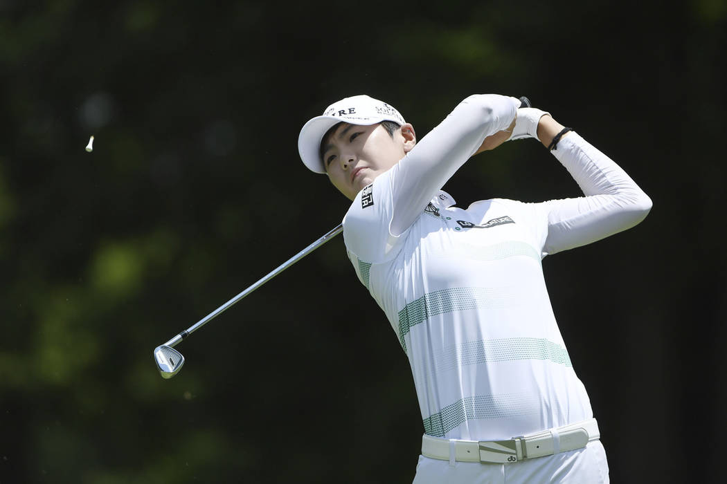 Sung Hyun Park watches her tee shot on the 3rd hole during the final round of the LPGA Walmart ...