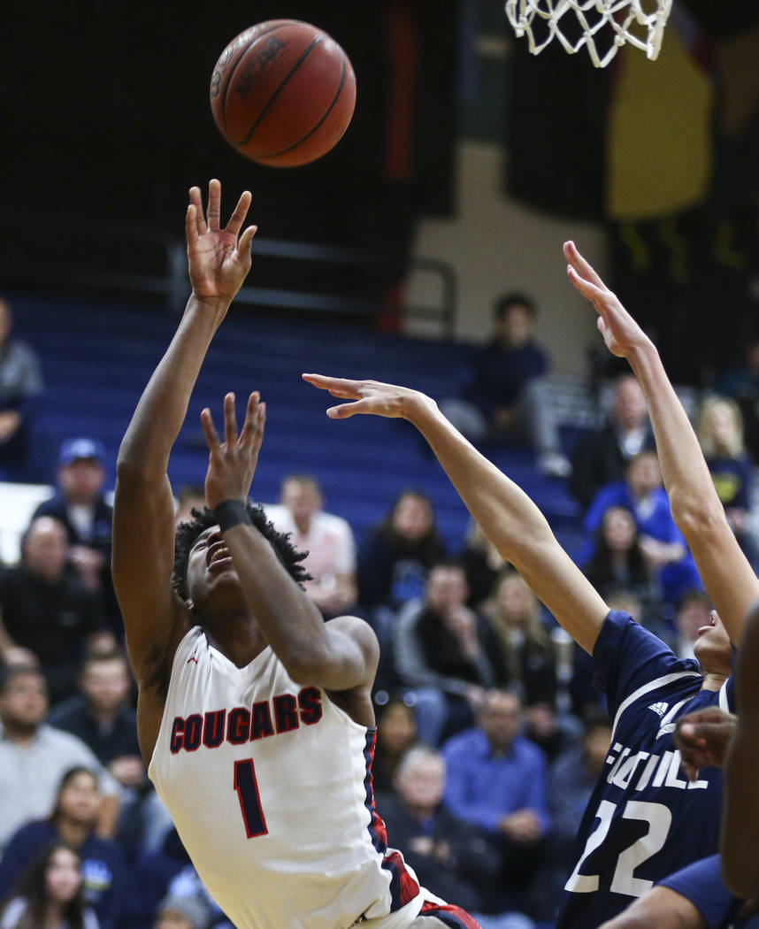 Coronado’s Jaden Hardy (1) goes to the basket against Foothill’s Jace Roquemore ...