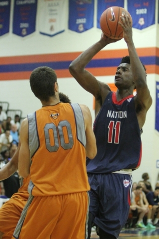 1Nation‘s Josh Jackson (11) gets ready to shoot the ball against BTI Select in the U17 ...